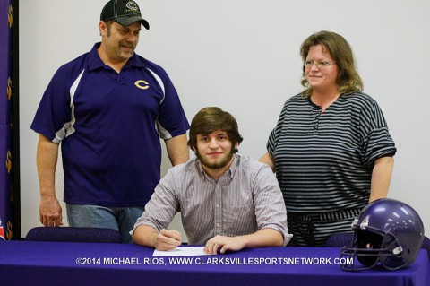 Clarksville High School football player Eyan Pope signs his national letter of intent with Kentucky Wesleyan.