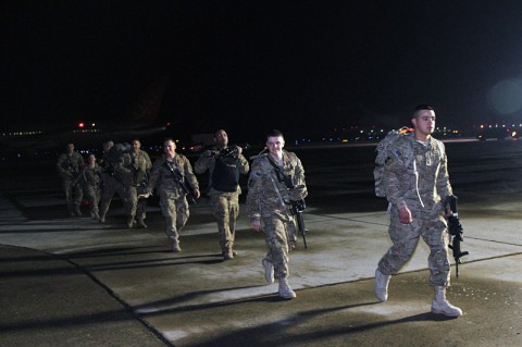 Soldiers from the 101st Sustainment Brigade, 101st Airborne Division (Air Assault), exit the plane as they return from a nine-month deployment to Afghanistan Feb. 9, at Campbell Army Airfield on Fort Campbell. While deployed, the soldiers of TF Lifeliner drove more than 70,000 miles on dangerous road in Afghanistan to support Operation Enduring Freedom. (Sgt. Leejay Lockhart, 101st Sustainment Brigade Public Affairs)