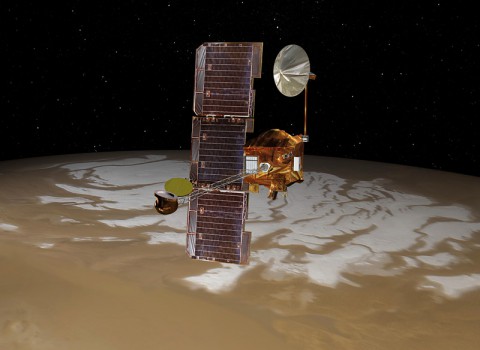 NASA's Mars Odyssey spacecraft passes above Mars' south pole in this artist's concept. The spacecraft has been orbiting Mars since October 24, 2001. (NASA/JPL) NASA's Mars Odyssey spacecraft passes above Mars' south pole in this artist's concept. The spacecraft has been orbiting Mars since October 24, 2001. (NASA/JPL)