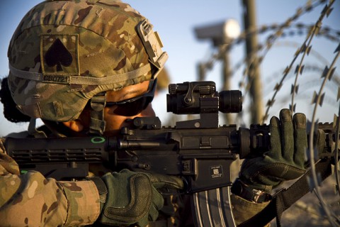 U.S. Army Capt. Carla L. Bender, a human resources officer assigned to the 4th Brigade Combat Team, 101st Airborne Division (Air Assault), pulls security during a battle drill on Forward Operating Base Lightning, Afghanistan, Sept. 3, 2013. (U.S. Army photo by Sgt. Justin A. Moeller/Released)