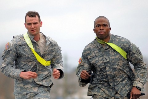 1st Lt. Andre Shinda (right) and Staff Sgt. Robert Herendeen (left) from 3rd Battalion, 187th Infantry Regiment, 3rd Brigade Combat Team “Rakkasans,” 101st Airborne Division (Air Assault), race to the finish line at the final event of the ‘Best Rakkasan’ competition here Feb. 20, 2014. The competition tested the two-Soldier teams mentally and physically over two days in a series of eight events to determine the Brigade’s premiere Soldiers. (Staff Sgt. Joel Salgado/U.S. Army)