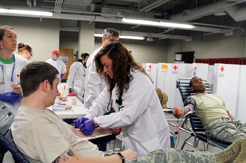 The 5th Special Forces Group (Airborne) donating blood in support of the local Red Cross. (Staff Sgt. Barbara Ospina)