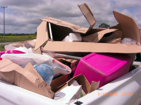 Shown are violations of the “Secure Load Law,” photographed by Sgt. Mike Leutert of the Environmental Enforcement Unit.