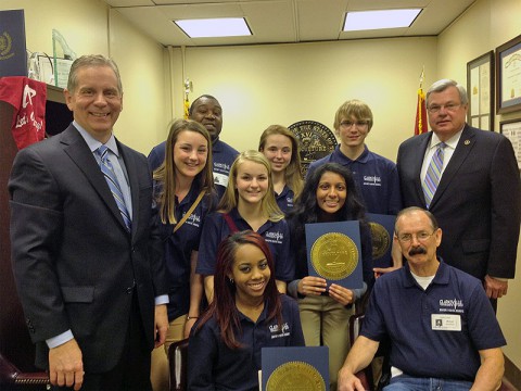 Pictured from left to right are State Representative Joe Pitts, Reagan Greene, Joe Bailey, Evelyn Turner, Kellie Bonham, Brinda Patel, Justin Doane, Speaker Pro Tem Curtis Johnson. Front Row is Angel McDowell and Mike Hutchinson.