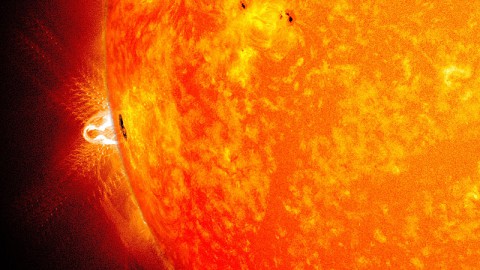 A giant sunspot appeared on Feb. 25, 2014, for its third trip across the face of the sun. This blend of two images from NASA's Solar Dynamics Observatory shows the sunspot in visible light and an X-class flare observable in ultraviolet light. (NASA/SDO/Goddard Space Flight Center) A giant sunspot appeared on Feb. 25, 2014, for its third trip across the face of the sun. This blend of two images from NASA's Solar Dynamics Observatory shows the sunspot in visible light and an X-class flare observable in ultraviolet light. (NASA/SDO/Goddard Space Flight Center)