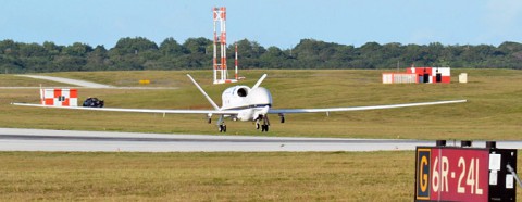 NASA's Global Hawk No. 872 flares for landing at Andersen Air Force Base on Guam to begin the 2014 ATTREX climate-change mission Jan. 17th. The two-month-long airborne science flight campaign wrapped up with the aircraft's return to NASA's Armstrong Flight Research Center March 14th. (U.S. Air Force)