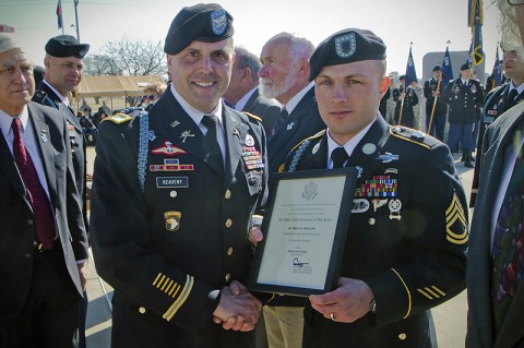 U.S. Army Sgt. 1st Class Billy R. Weiland, a Soldier with 1st Battalion, 506th Infantry Regiment, 4th Brigade Combat Team, 101st Airborne Division (Air Assault), was presented a certificate by Col. Val C. Keavney Jr., commander of the 4th BCT, 101st Abn. Div., formally inducting him as a Distinguished Member of the 506th Infantry Regiment, during a ceremony March 13, 2014. (U.S. Army photo by Sgt. Justin A. Moeller, 4th Brigade Combat Team Public Affairs) U.S. Army Sgt. 1st Class Billy R. Weiland, a Soldier with 1st Battalion, 506th Infantry Regiment, 4th Brigade Combat Team, 101st Airborne Division (Air Assault), was presented a certificate by Col. Val C. Keavney Jr., commander of the 4th BCT, 101st Abn. Div., formally inducting him as a Distinguished Member of the 506th Infantry Regiment, during a ceremony March 13, 2014. (U.S. Army photo by Sgt. Justin A. Moeller, 4th Brigade Combat Team Public Affairs)