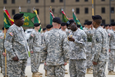 Command Sgt. Maj. Eugene Thomas Jr., a native of Greenville, Fla., inspects the NCO sword during a change of responsibility ceremony April 14, at Fort Campbell, Ky. The sword represents the trust and confidence the Army places in the NCO Corps. (Sgt. Leejay Lockhart/U.S. Army) Command Sgt. Maj. Eugene Thomas Jr., a native of Greenville, Fla., inspects the NCO sword during a change of responsibility ceremony April 14, at Fort Campbell, Ky. The sword represents the trust and confidence the Army places in the NCO Corps. (Sgt. Leejay Lockhart/U.S. Army)