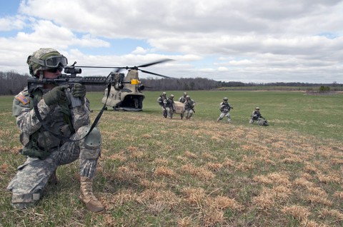 Soldiers with 3rd Battalion, 320th Field Artillery Regiment, 3rd Brigade Combat Team "Rakkasans," 101st Airborne Division (Air Assault), secure a landing zone during the full dress rehearsal for Operation Golden Eagle here April 4, 2014. The four-day exercise was the first brigade-size air assault operation conducted by the 101st Abn. Div. in more than a decade and featured Soldiers from 3rd BCT and 101st Combat Aviation Brigade "Wings of Destiny," moving more than 1,100 Soldiers and sling-loading more than 20 pieces of equipment. (Photo by Staff Sgt. Joel Salgado, 3rd BCT Public Affairs)