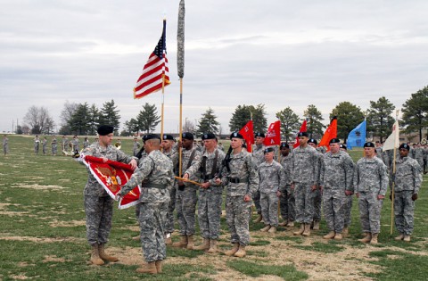 Lt. Col. Zachary Miller (left), commander of the former 3rd Special Troops Battalion and commander of the newly reflagged 21st Brigade Engineer Battalion, and Command Sgt. Maj. Martin Humphreys, the senior enlisted advisor for 21st BEB, uncase the colors of the newly stood up 21st BEB during a ceremony at the division parade field on Fort Campbell, March 27, 2014. (Photo by Sgt. Brian Smith-Dutton, 3rd BCT Public Affairs)