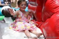 A young girl enjoys one of the Inflatables at the 2014 Rivers and Spires Festival