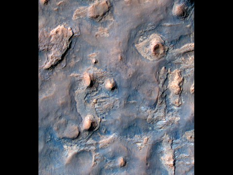 NASA's Curiosity Mars rover and tracks from its driving are visible in this view from orbit, acquired on April 11th, 2014, by the High Resolution Imaging Science Experiment (HiRISE) camera on NASA's Mars Reconnaissance Orbiter. (NASA/JPL-Caltech/Univ. of Arizona)