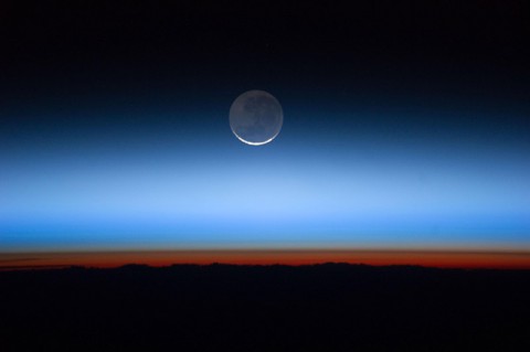 Astronauts aboard the International Space Station captured this photograph of Earth's atmospheric layers on July 31, 2011, revealing the troposphere (orange-red) to the stratosphere and above. Earth-observing instruments in space allow scientists to better understand the chemistry and dynamics occurring within and between these layers. (NASA/JSC Gateway to Astronaut Photography of Earth)