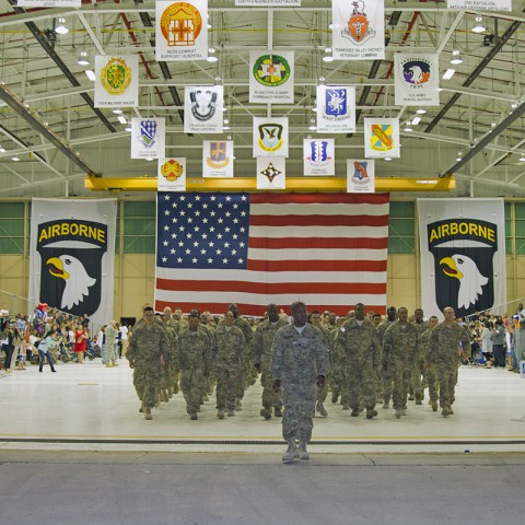 Capt. Patrick L. Peacock, commander of the 227th Quartermaster Company, 129th Combat Sustainment Support Battalion, 101st Sustainment Brigade, 101st Airborne Division (Air Assault), leads his Soldiers to their final stop before the unit releases them to their Families after a nine-month deployment to Afghanistan, May 4, at Fort Campbell, Ky. (U.S. Army photo by Sgt. 1st Class Mary Rose Mittlesteadt, 101st Sustainment Brigade Public Affairs)