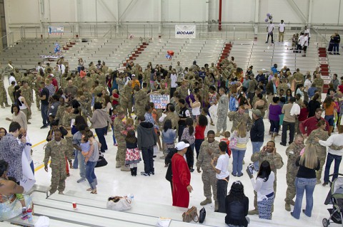 Hanger 3 at Campbell Army Airfield turned into a scene of joyful chaos moments after the Soldiers of the 227th Quartermaster Company, 129th Combat Sustainment Support Battalion, 101st Sustainment Brigade, 101st Airborne Division (Air Assault), received permission to break ranks and reunite with their Families May 4, at Fort Campbell. (U.S. Army photo by Sgt. 1st Class Mary Rose Mittlesteadt, 101st Sustainment Brigade Public Affairs)