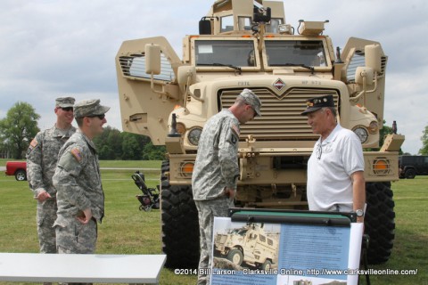 A 101st Airborne Division veteran  talks with current soldiers from the division.