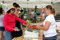 A shopper pays for her purchase