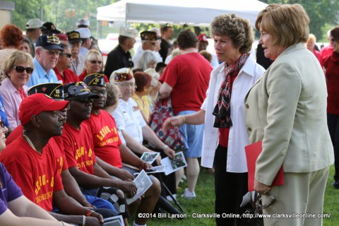 Clarksville Mayor Kim McMillan and Montgomery County Mayor Carolyn Bowers talk to veterans at the 2014 Montgomery County Memorial Day Ceremony