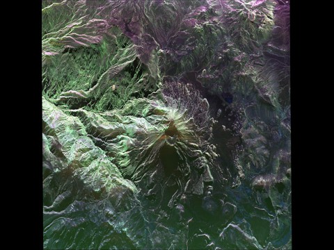 This false-color image of Peru's Ubinas volcano was acquired on April 14, 2014, by NASA's Uninhabited Aerial Vehicle Synthetic Aperture Radar, or UAVSAR. (NASA/JPL-Caltech)