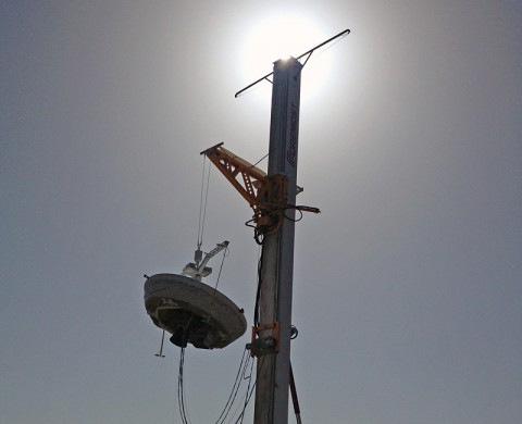 The launch tower helps link the Low-Density Supersonic Decelerator test vehicle to a balloon; once the balloon floats up, the vehicle is released from the tower and the balloon carries it to high altitudes. The vehicle's rocket will take it to even higher altitudes, where the supersonic test begins. (NASA/JPL-Caltech) The launch tower helps link the Low-Density Supersonic Decelerator test vehicle to a balloon; once the balloon floats up, the vehicle is released from the tower and the balloon carries it to high altitudes. The vehicle's rocket will take it to even higher altitudes, where the supersonic test begins. (NASA/JPL-Caltech)