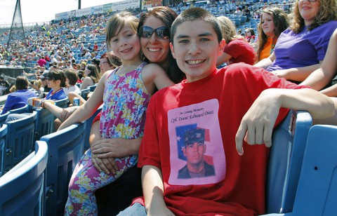 The Nashville Sounds hosted a Veteran and Surviving Military Game on Sunday, May 18. The Sounds honored Gold Star families before the game on the field. Amber Diaz's husband, Army Cpl. Isaac Diaz, was killed in action in Afghanistan in 2004. Her son, Aaron Diaz, was only three years old when his father passed. Aaron threw out the first pitch of the game in honor of his father. (U.S. Army Photo by Staff Sgt. Melisa Washington)