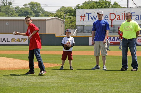 The Nashville Sounds hosted a Veteran and Surviving Military Game on Sunday, May 18. The Sounds honored Gold Star families before the game on the field. Amber Diaz's husband, Army Cpl. Isaac Diaz, was killed in action in Afghanistan in 2004. Her son, Aaron Diaz, was only three years old when his father passed. Aaron threw out the first pitch of the game in honor of his father. (U.S. Army Photo by Staff Sgt. Melisa Washington)
