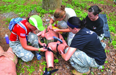 As part of the SOAR Challenge, spouses were given a crash course in emergency field medical treatment. The training was put to use in a land navigation excerise in which included finding "casualties."(Major Alan Hill, 160th SOAR (A) Public Affairs) As part of the SOAR Challenge, spouses were given a crash course in emergency field medical treatment. The training was put to use in a land navigation excerise in which included finding "casualties."(Major Alan Hill, 160th SOAR (A) Public Affairs)