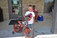 Salvatore Evangelista was one of the lucky raffle winners who took home a Cars themed bike.