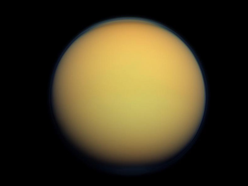 New research on the nitrogen in Titan's atmosphere indicates that the moon's raw materials might have been locked up in ices that condensed before Saturn began its formation. (NASA/JPL-Caltech/Space Science Institute)
