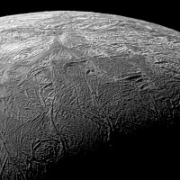 This is a close-up view of the fractures on Enceladus taken by Cassini during its flyby Nov. 21, 2009. The area, about 504 kilometers (313 miles) across, focuses on Baghdad Sulcus, a fracture in the south polar region. (NASA/JPL/SSI)