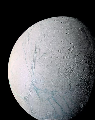 This is a mosaic of images showing cracks in Saturn's moon Enceladus taken by the Cassini spacecraft during its close flyby on March 9 and July 14, 2005. (NASA/JPL/Space Science Institute)