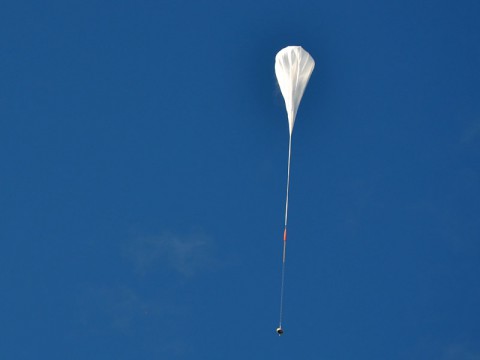 The test vehicle for NASA's Low-Density Supersonic Decelerator rides on a balloon to high altitudes above Hawaii. (NASA/JPL-Caltech) The test vehicle for NASA's Low-Density Supersonic Decelerator rides on a balloon to high altitudes above Hawaii. (NASA/JPL-Caltech)
