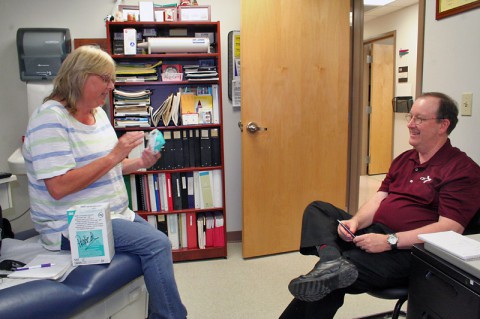 Blanchfield Army Community Hospital's Preventive Medicine respiratory surveillance technician Joyce Espinoza responded to Concurrent Technologies Corporation senior safety professional David Caswell May 30 as part of the audit performed by the MEDCOM Safety Management team. (U.S. Army - Laura Boyd)