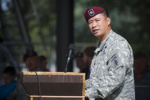 Lt. Col. Fred L. Dela Cruz, outgoing commander of the Group Support Battalion, 5th Special Forces Group (Airborne), gives a speech during GSB change of command ceremony held July 25, 2014, here at Gabriel field.  (Sgt. Justin A. Moeller/U.S. Army)