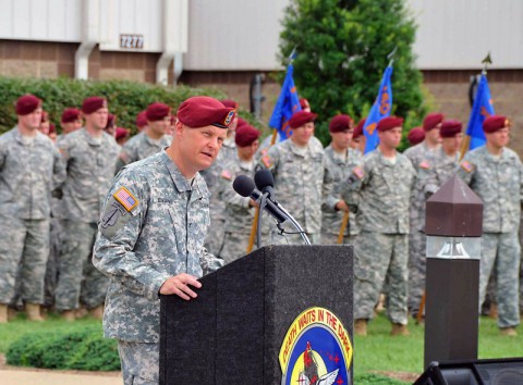 Col. John R. Evans, outgoing commander, 160th Special Operations Aviation Regiment (Airborne) addresses hundreds of distinguished visitors, Gold Star Family Members, Soldier and civilians following the change of command ceremony conducted on the Gen. Bryan Brown Compound, Fort Campbell, KY, June 27, 2014. (U.S. Army photo)