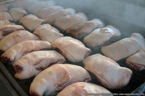 Central Civitan Club are cooking 30 shoulders for Saturday's Lone Oak Picnic.