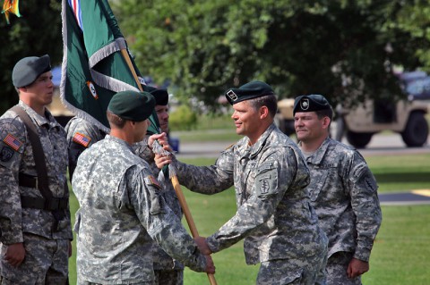 Col. John W. Brennan, commander of the 5th Special Forces Group (Airborne), passes the colors to Lt. Col. Brent W. Lindeman, the incoming commander of 3rd Battalion, 5th SFG(A), during a change of command ceremony, July 1, 2014, held at Gabriel Field. (Pfc. Robert Vanegas) Col. John W. Brennan, commander of the 5th Special Forces Group (Airborne), passes the colors to Lt. Col. Brent W. Lindeman, the incoming commander of 3rd Battalion, 5th SFG(A), during a change of command ceremony, July 1, 2014, held at Gabriel Field. (Pfc. Robert Vanegas)