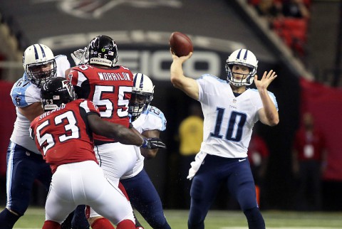 Tennessee Titans quarterback Jake Locker (10) attempts a pass against the Atlanta Falcons in the first quarter of their game at the Georgia Dome last week. (Jason Getz-USA TODAY Sports)