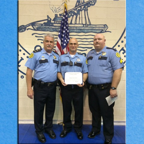 Lt. Cliff Smith poses with Deputy Bryan Green and Sgt. Robert Boone after Green graduated from Tennessee Law Enforcement Training Academy today