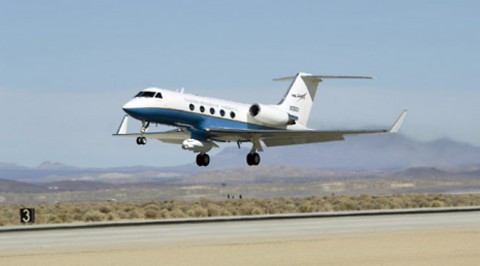 NASA's C-20A Earth science research aircraft with the UAVSAR slung underneath its belly lifts off the runway at Edwards Air Force Base on a prior radar survey mission. (NASA Armstrong)