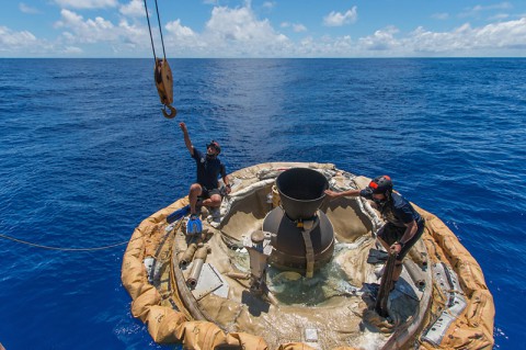 Divers retrieve the test vehicle for NASA's Low-Density Supersonic Decelerator off the coast of the U.S. Navy's Pacific Missile Range Facility in Kauai, Hawaii. (NASA/JPL-Caltech)