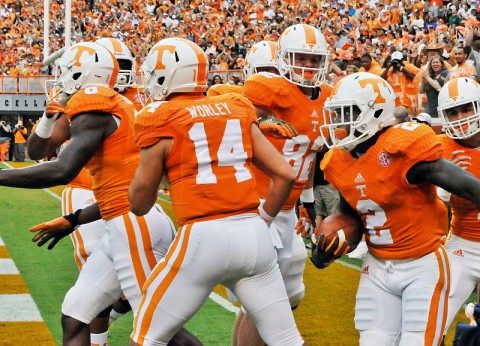 Tennessee Volunteers wide receiver Pig Howard (2) celebrates with teammates after scoring a touchdown against Utah State Aggies linebacker Nick Vigil (41) (not pictured) during the first half at Neyland Stadium. (Jim Brown-USA TODAY Sports)