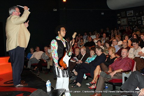 Sammy Stuard of F&M Bank auctions a guitar at the 2010 Roxy Gala