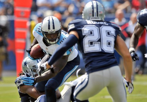 Tennessee Titans tight end Delanie Walker (82) rushes against Dallas Cowboys defensive back Sterling Moore (26) during the first half at LP Field last Sunday. (Jim Brown-USA TODAY Sports)