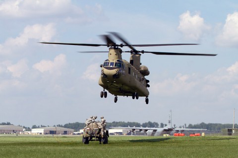 Soldiers from the 584th Support Maintenance Company, 129th Combat Sustainment Support Battalion, 101st Sustainment Brigade, 101st Airborne Division, prepare to sling load a water buffalo to a CH-47 Chinook helicopter Sept. 3 at Fort Campbell, Ky. (Sgt. Leejay Lockhart, 101st Sustainment Brigade Public Affairs)