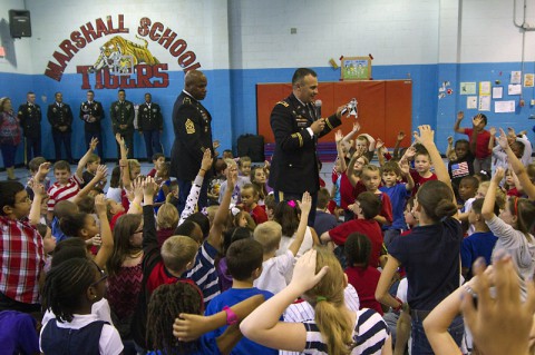 Soldiers from the 101st Special Troops Battalion, 101st Sustainment Brigade, 101st Airborne Division, commemorated the Sept. 11 attacks on the United States with the students and staff at Marshall Elementary School during an assembly Sept. 11 at Fort Campbell, KY. (U.S. Army photo by Sgt. Leejay Lockhart, 101st Sustainment Brigade)