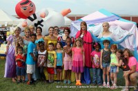 Children pose with the Disney Princesses at the 2014 Riverfest Festival