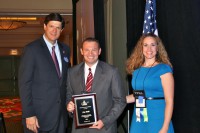 Joey Smith receiving the Public Health Worker of the Year award