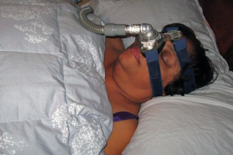 Sleep Apnea - Woman wearing CPAP. (American Heart Association)