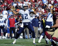 Tennessee Titans quarterback Charlie Whitehurst (12) drops back to pass against the Washington Redskins during the first half at FedEx Field. (Brad Mills-USA TODAY Sports)